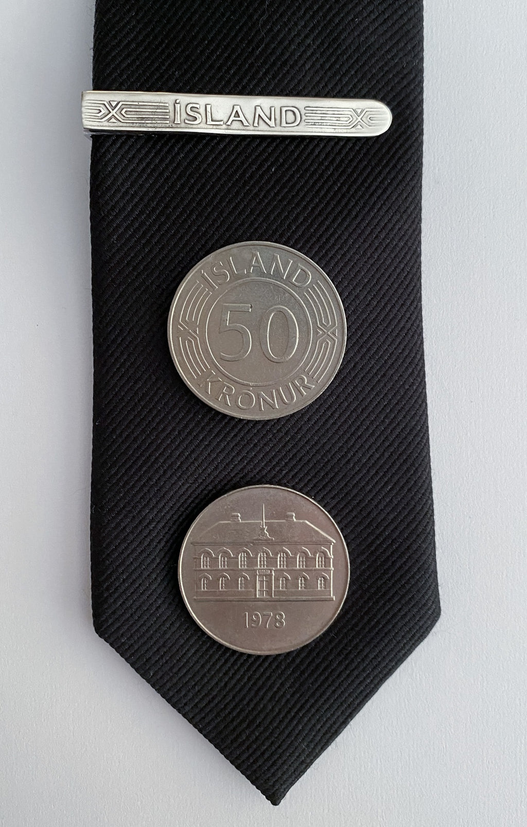 Bindisnæla úr 50 krónum - Silfurlituð